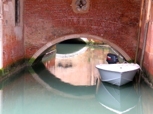 You would have to lie pretty flat in your boat to make it through this canal!